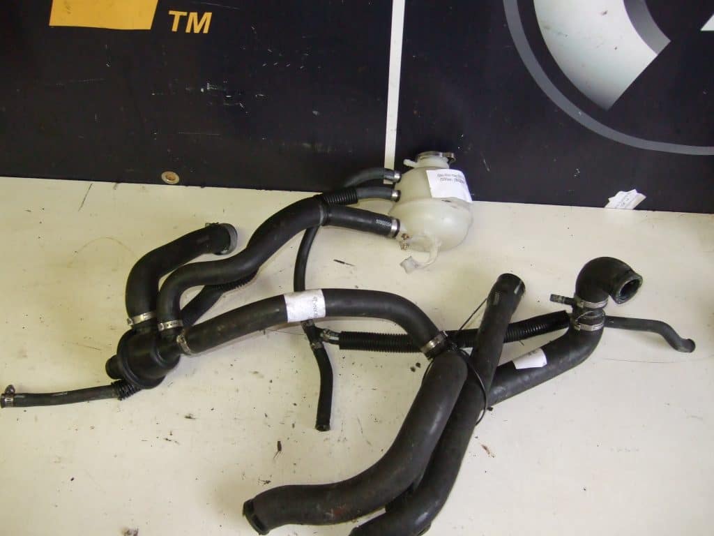 Ski-doo mxz 500ss -09  Kylarslangar inkl behållare