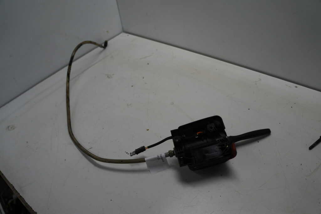 Polaris Switchback 600 -05  Bromshandtag inkl. behållare