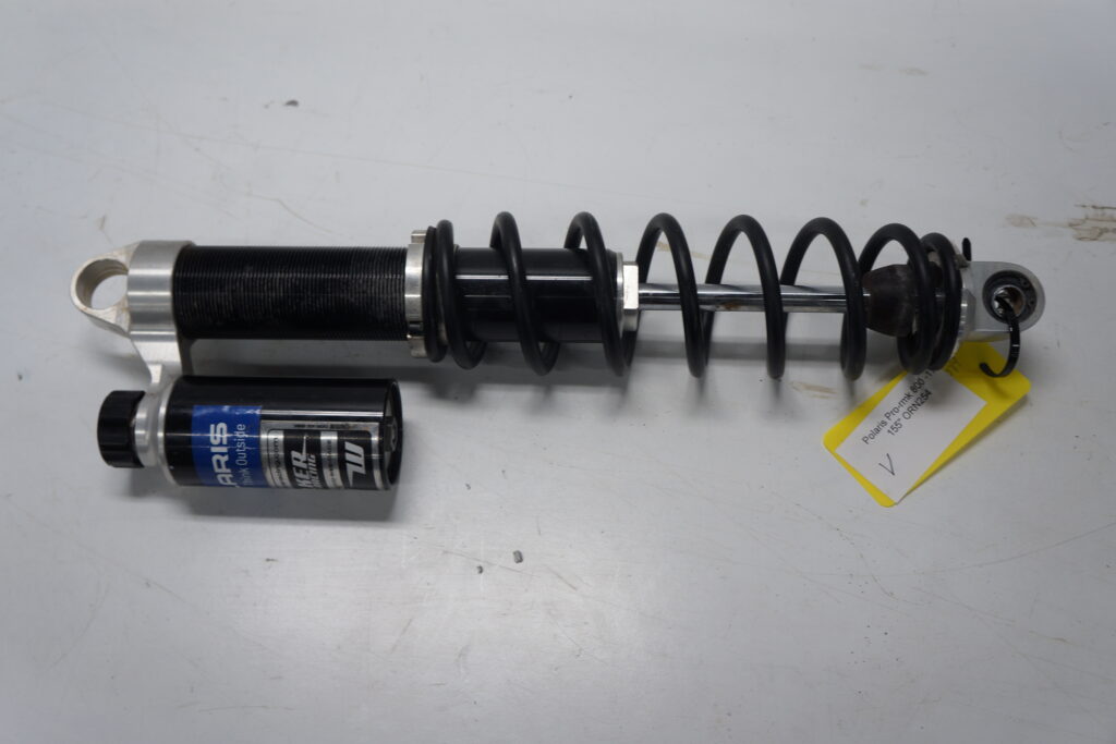 Polaris Pro-rmk 800 -17  Framvagnsstötdämpare vänster 1st